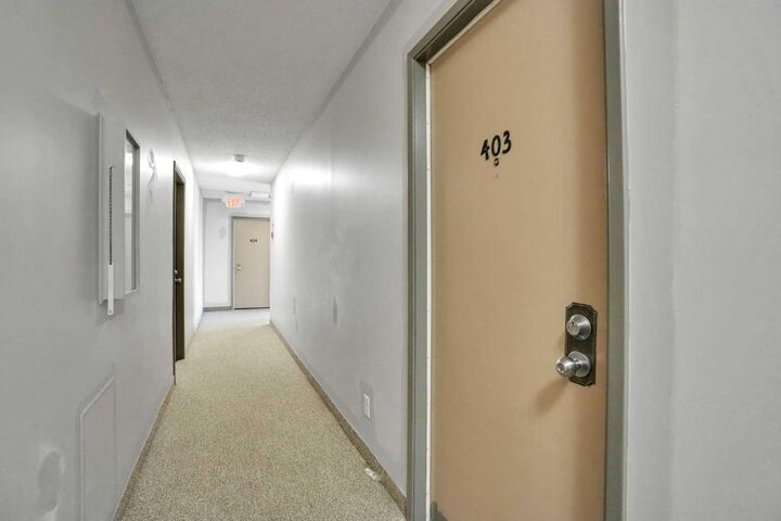 Property Photo: 635 56 Avenue SW 403 AB T2V 0G9