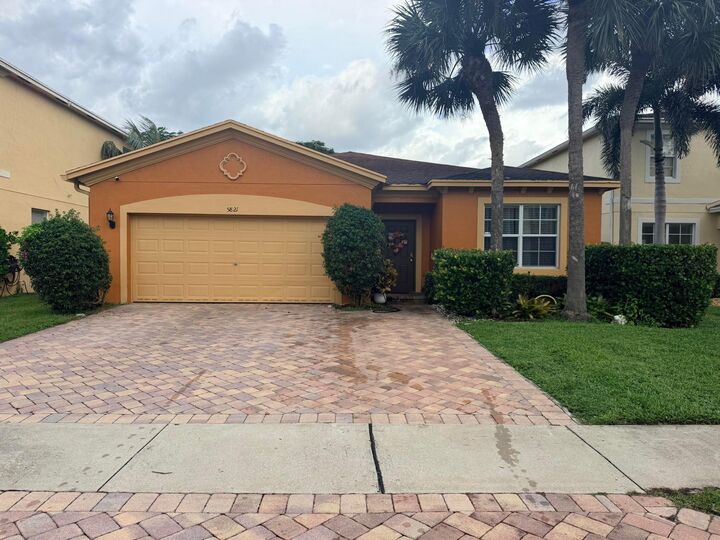 Property Photo: 5821 Gypsum Place FL 33413
