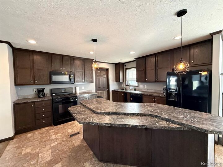 Property Photo:  9784 Birmingham Street  MI 48430 