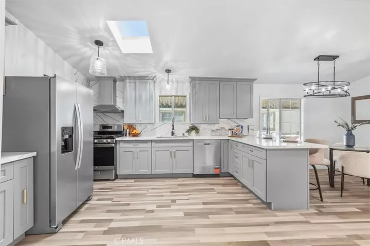 Property Photo:  9080 Bloomfield 153  CA 90630 