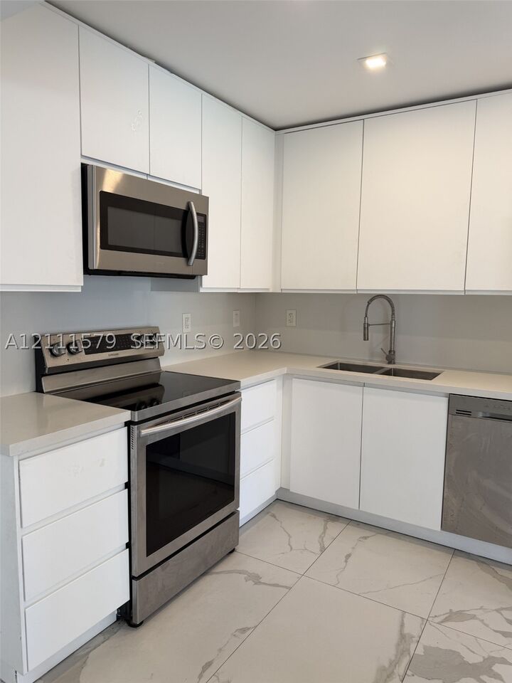 Property Photo:  17560 Atlantic Blvd 106  FL 33160 
