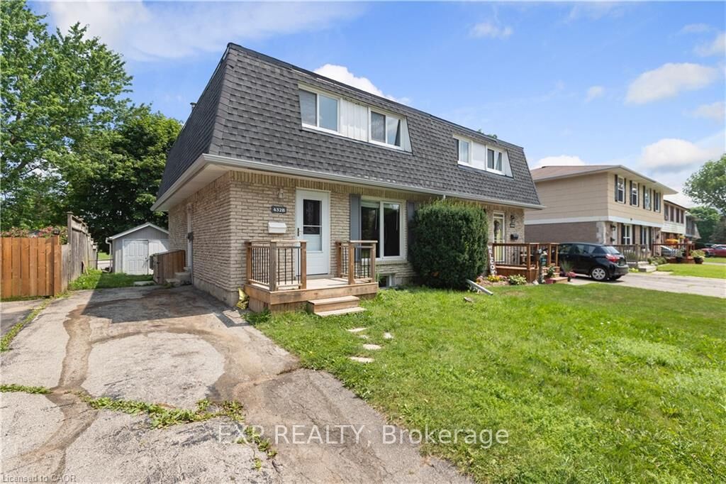 Property Photo:  432B Dunvegan Drive  ON N2K 2C7 