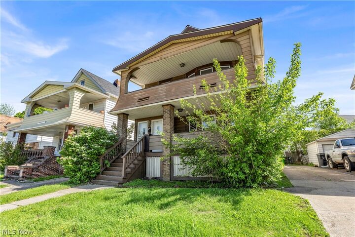 Property Photo: 8341 Garfield Boulevard 1/Dn OH 44125