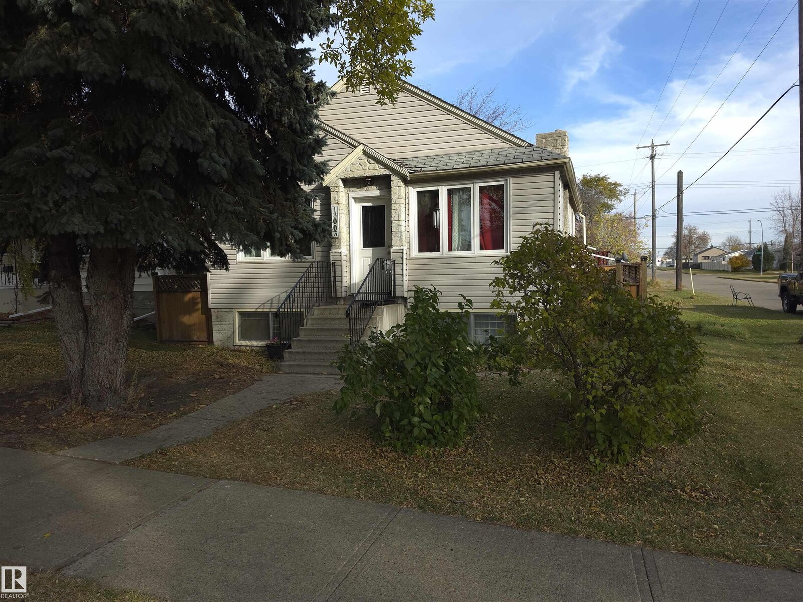 Property Photo:  13003 65 Street NW  AB T5A 0Z9 