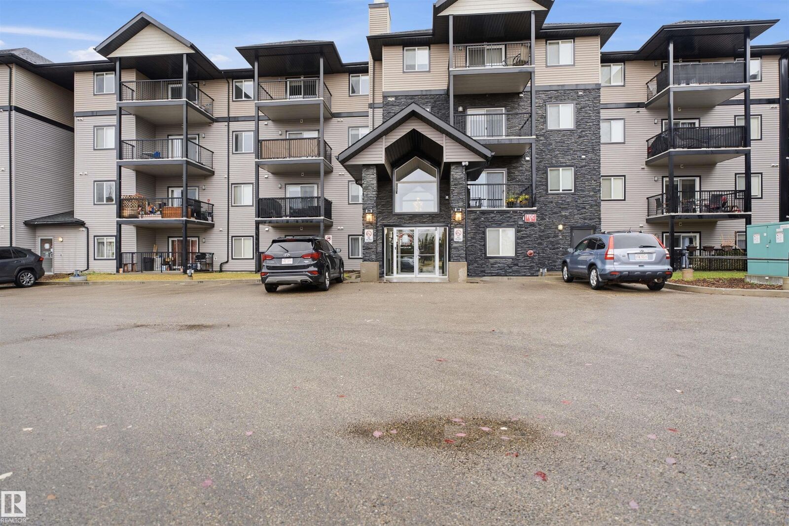 Property Photo:  14808 125 Street NW 312  AB T5X 0G1 