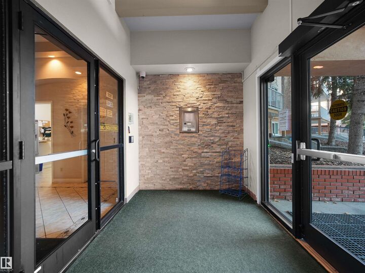 Property Photo:  10935 21 Avenue NW 314  AB T6J 6R3 