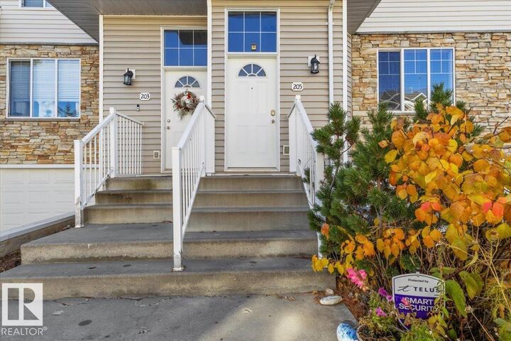 Property Photo: 178 Bridgeport Boulevard 205 AB T9E 8S8