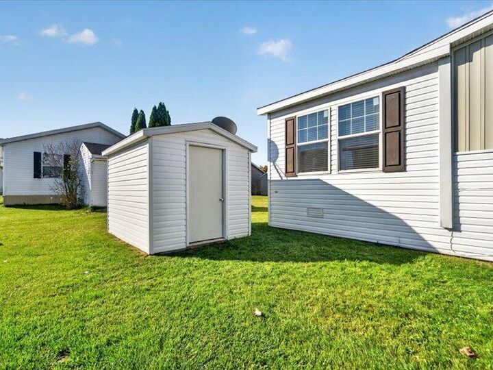 Property Photo:  1037 Cambry Circle  MI 49240 