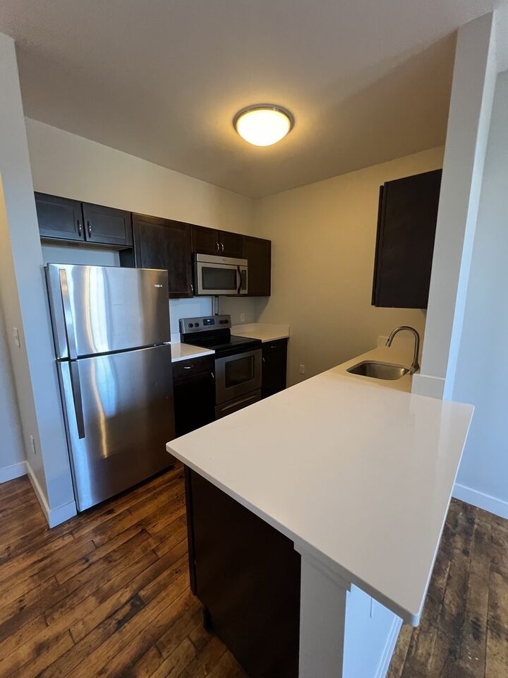 Property Photo: 124 Montello St 406 MA 02301