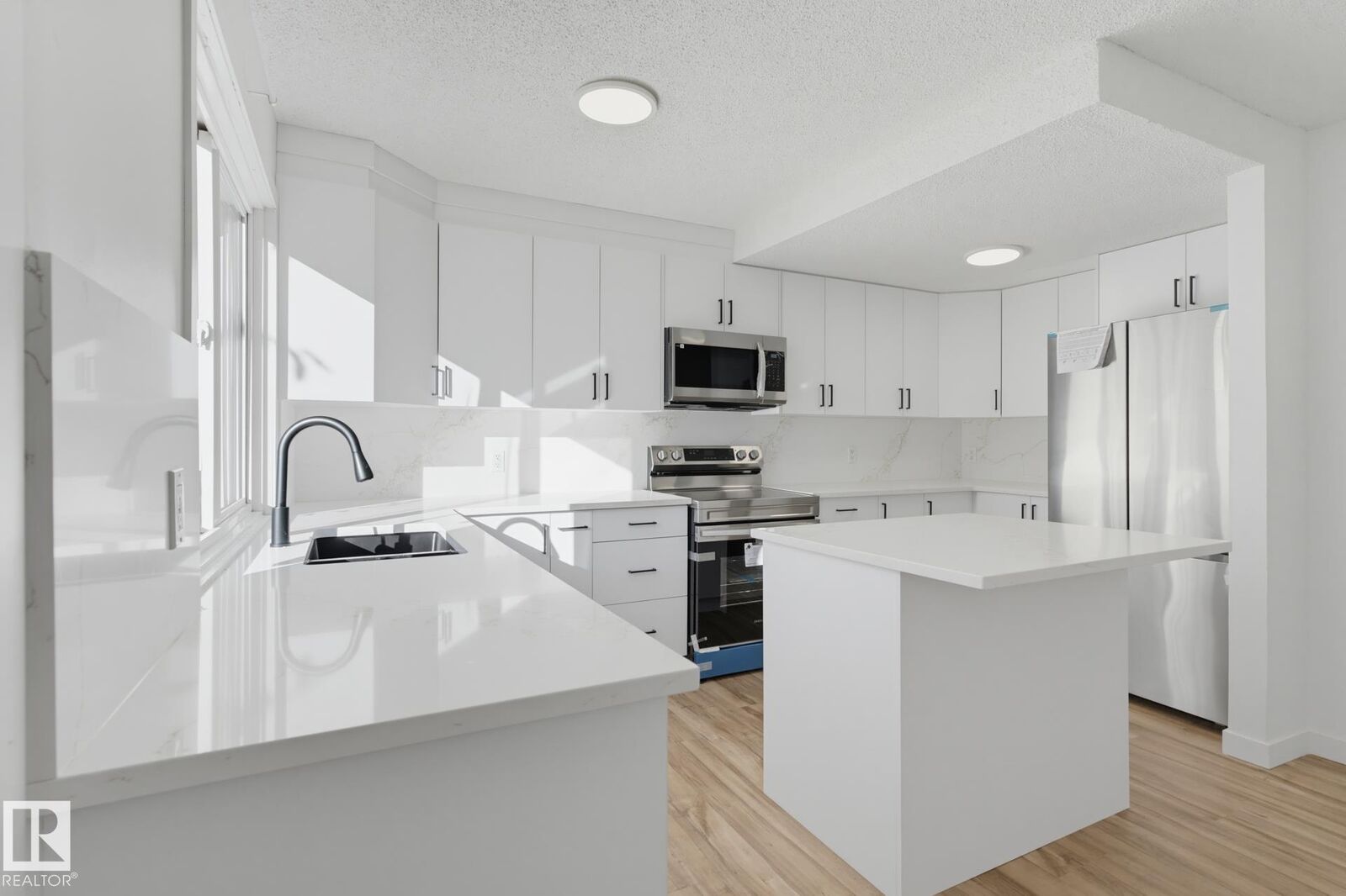 Property Photo: 133 Woodstock NW AB T5T 0H6