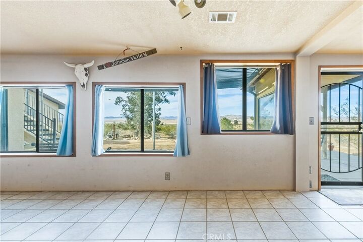 Property Photo:  5975 Desert Star  CA 92285 