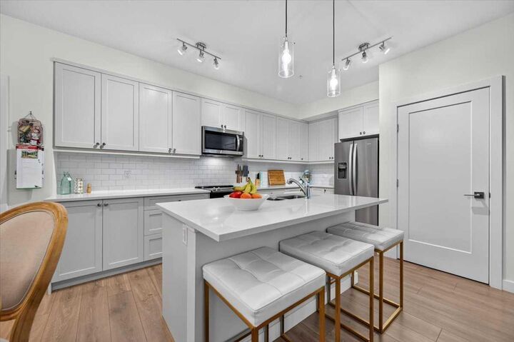Property Photo:  100 Auburn Meadows Manor SE 116  AB T3M 3H2 