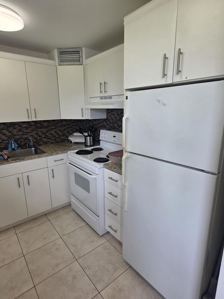 Property Photo:  241 Southampton C  FL 33417 